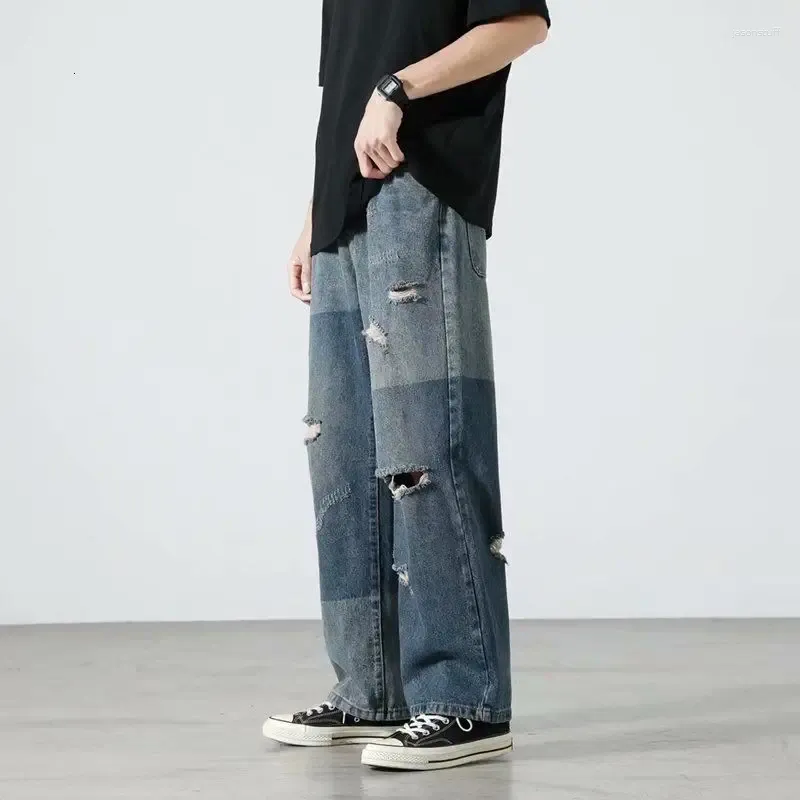 Jeans da uomo strappati gamba larga moda retrò larghi Harajuku uomo streetwear pantaloni larghi in denim dritto con foro hip-hop da uomo