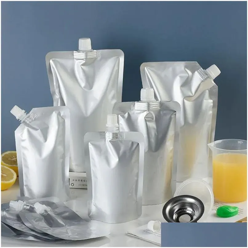 Verpakkingszakken Groothandel 100 stuks Stand-Up Sier Aluminiumfolie Squeeze Nozzle Bag voor drank Verzegelde stand-up opslag Herbruikbaar D Dhgarden Dhqxj