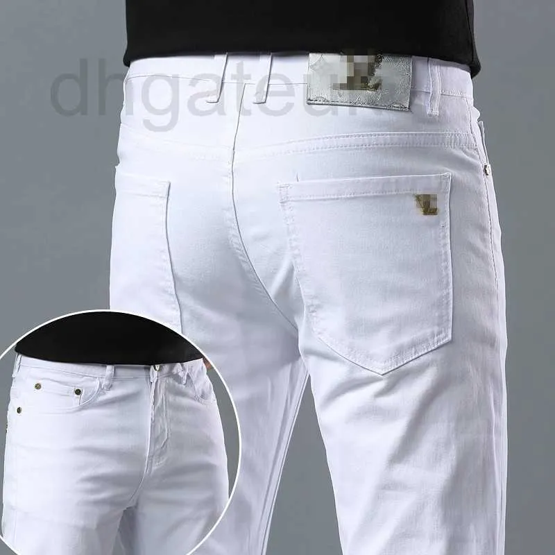 Jeans pour hommes marque de créateur printemps / été nouveau pour la lumière de luxe édition coréenne pieds élastiques minces coupe ajustée coton pur blanc pantalon long européen A0LG