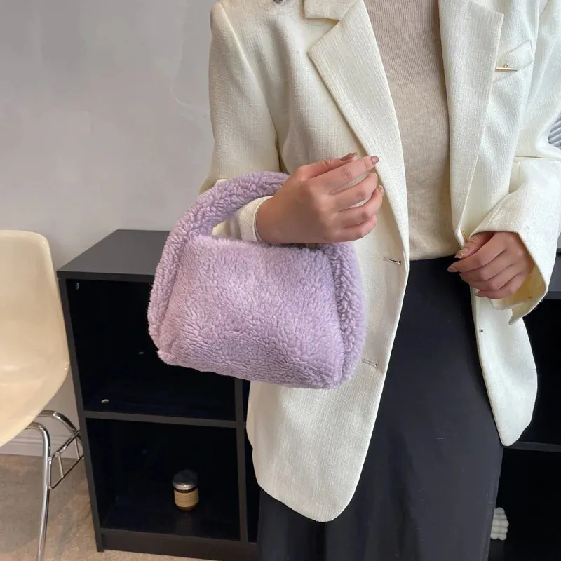 Borsa da donna di lusso leggero Design per il tempo libero Moda Tendenza Cerniera Auto Cucito Capelli di coniglio Borsa da donna leggera 231226