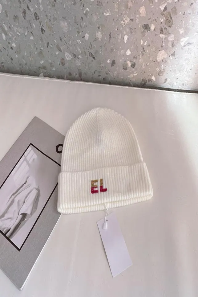 El gorro de invierno de diseño de lujo está hecho de cachemira y pelo de conejo, un estilo clásico cálido y cómodo adecuado para hombres y mujeres ver7874712