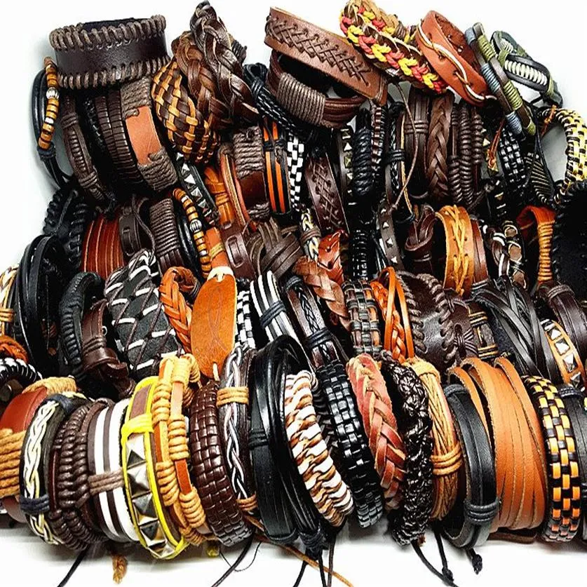 Lotes enteros a granel 100 Uds. Lote estilos de mezcla hechos a mano para hombres brazalete de cuero real tribus étnicas pulseras de moda a estrenar 213p