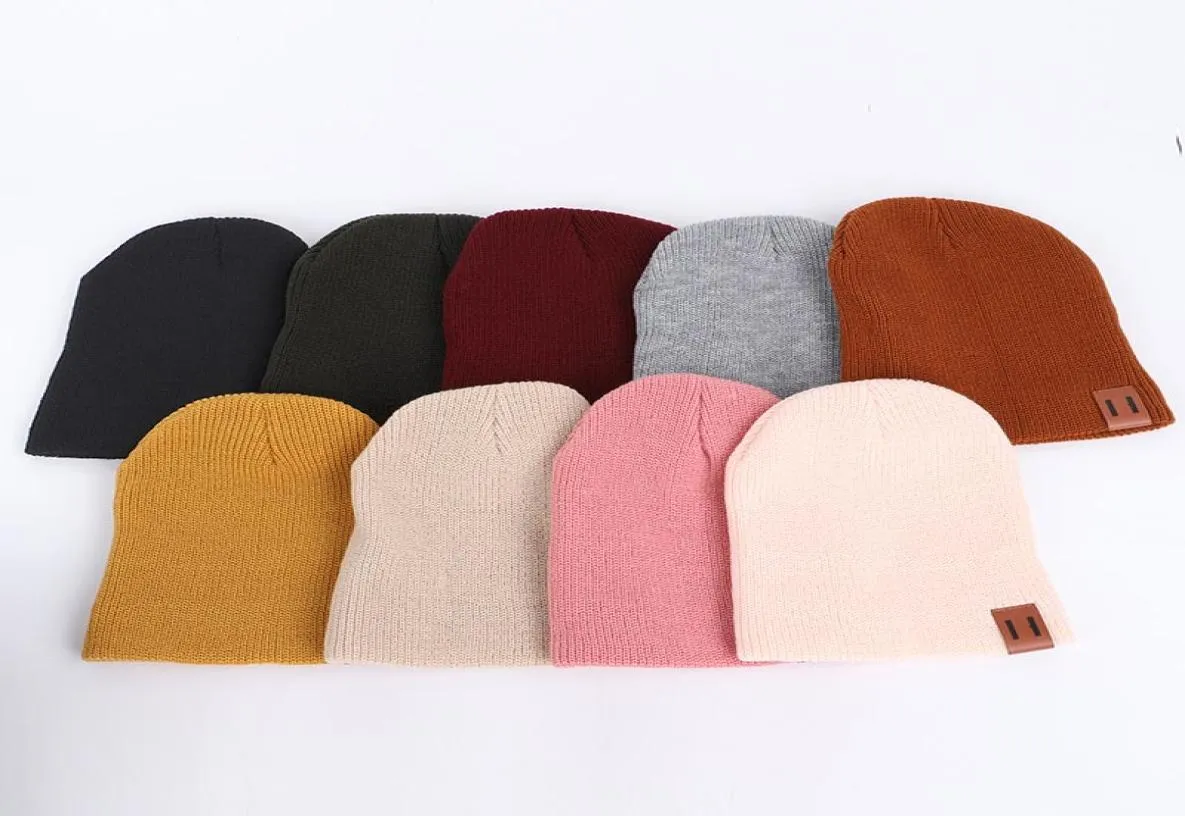 Nuovo arrivo classico lavorato a maglia cappelli caldi per adulti e bambini taglia colori puri berretti con etichetta naso di maiale berretto solido intero2897178