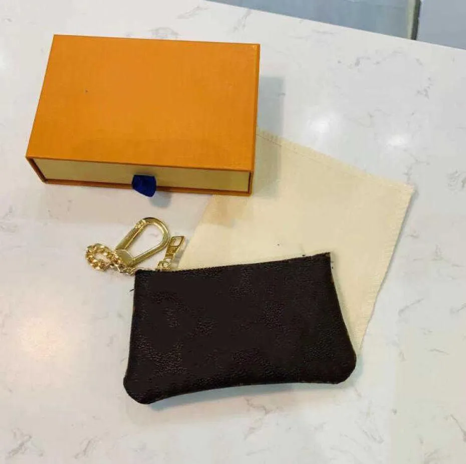 Luksusowa modna torba na klucz Premium Wysokiej jakości Klasyczne kobiece męskie uchwyt na mini monety torebka na małą skórzaną torebkę z BO9411373