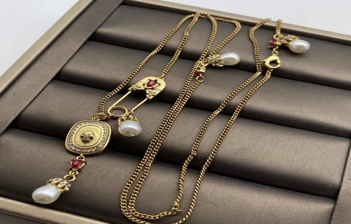 Nya designade dödskallar hängande korthängen kvinnor039s halsband damer vintage mässing pärlhalsband designer smycken 0319243490