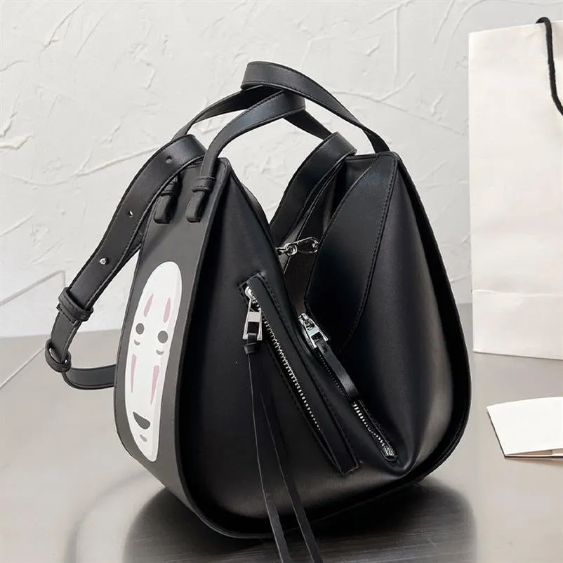 Tasarımcı Kadın çanta çanta çanta dişi yüzsüz erkekler büyük kapasiteli karikatür ruhlu sırt çantası tek omuz çantası 318r