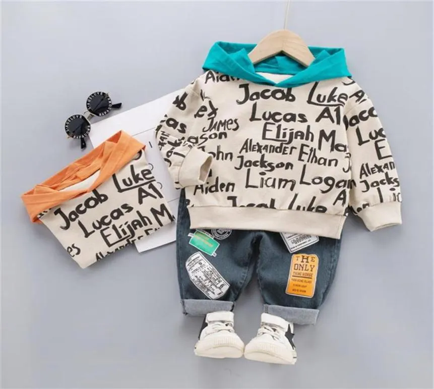 Designer barn modekläder passar våren barn pojke tjej brev hoodies jeans 2 st -set set baby småbarn kläder spädbarn sportwe214878848