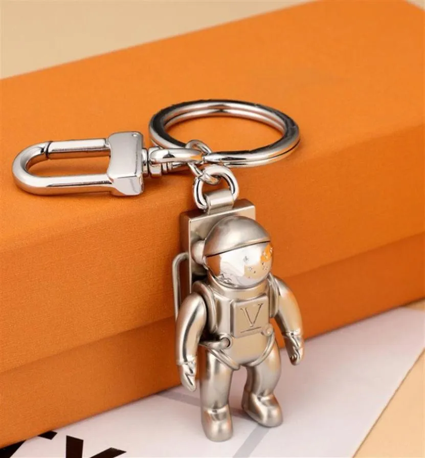 Moda elegante luxo designer chaveiro clássico chave fivela astronauta pingente fosco prata chaveiros para homens mulheres saco pingente209396651