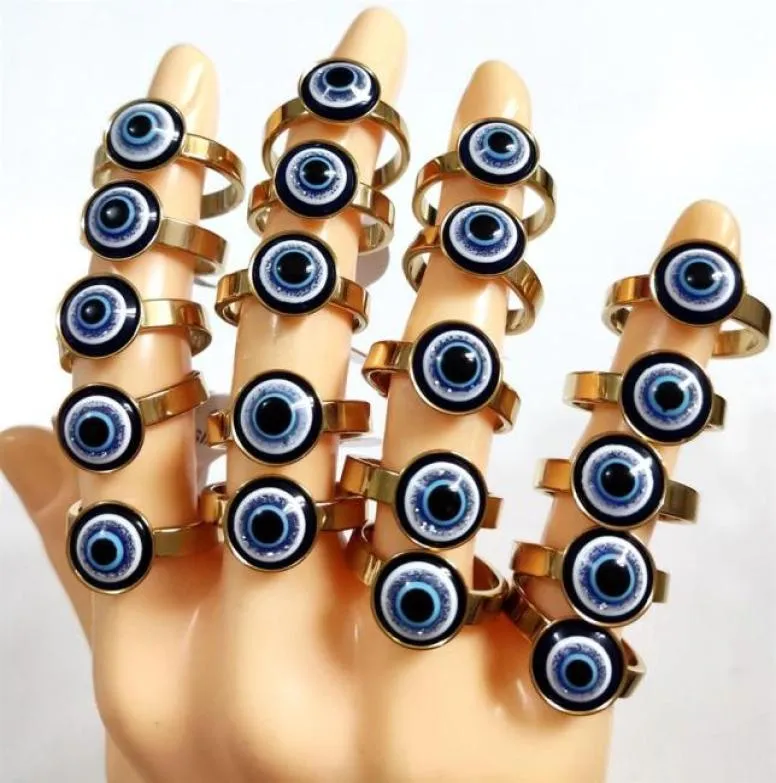 Entier 25pcs / lot Vintage Blue Evil Eye En Acier Inoxydable Or Punk Bague Femmes Accessoires Cadeau Hommes Rétro Bague De Fête Unique27831805296