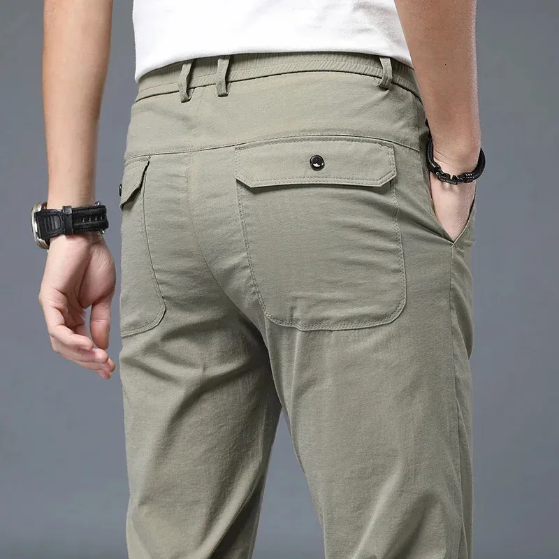 Koreański styl mężczyźni Casual Spodnie cienki lato regularne spodni ładunkowy splatyczne talia czarne spodnie moda szary czarny khaki 883 231226