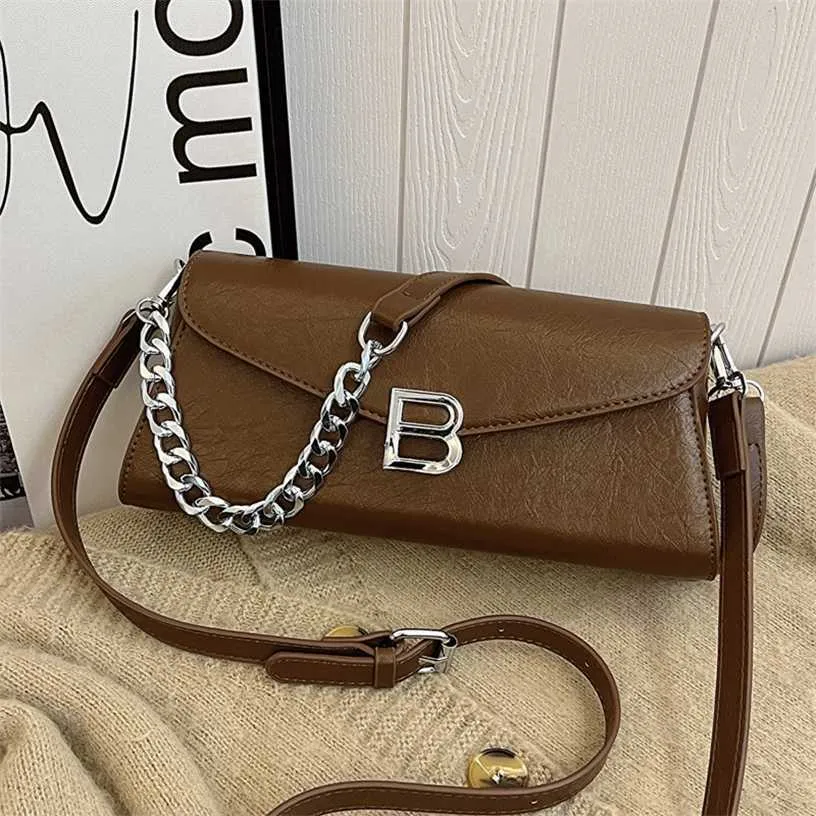 60% rabatt designer väska texturkedja vinter ny kvinnors maillard axel hand grepp mönster crossbody väska tidvatten