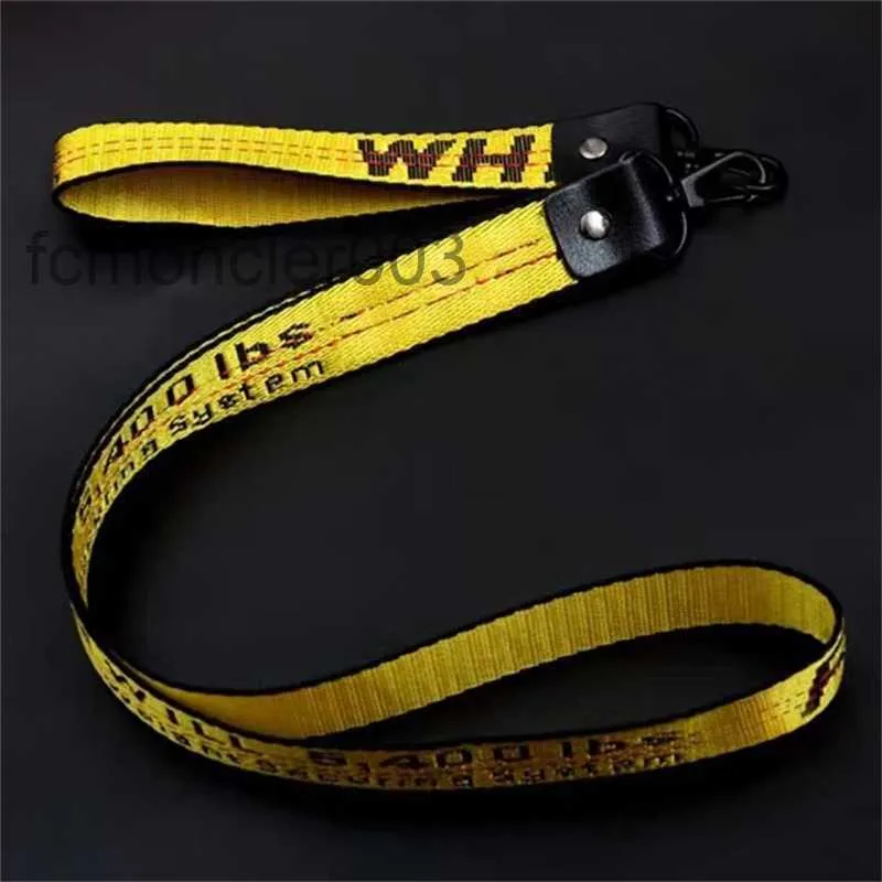 Sleutelhanger Industrieel Lanyard Lange sleutelhanger Gele nylon riem Halter Mode Bagagehanger Unisex Merkontwerper Gesneden legering Gesp HPQ2