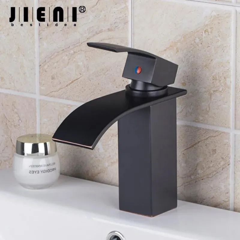 Faucets JIENI Oil Rubbed Bronze Finish Deck Mounted Bathroom Basin Mixer Tap Faucet Single Handle Waterfall Spout Bath Tap