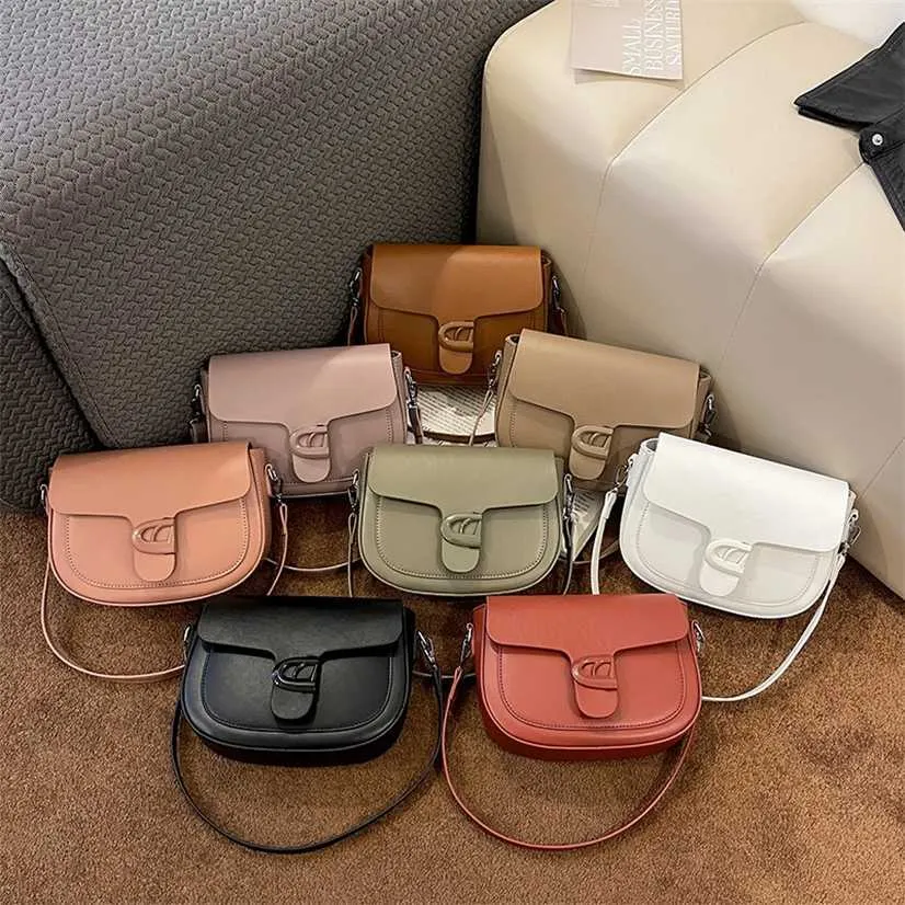 26% OFF Designer bag Spring New Women's Fashionable Versatile Saddle French Small Stand One Shoulder Solid Color Simple Crossbody Bag