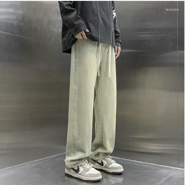 Męskie spodnie jesienne moda Przystojna swobodna młodzież z elastyczną talią dżinsy sag szerokie nogi długie rozmiar 3xl