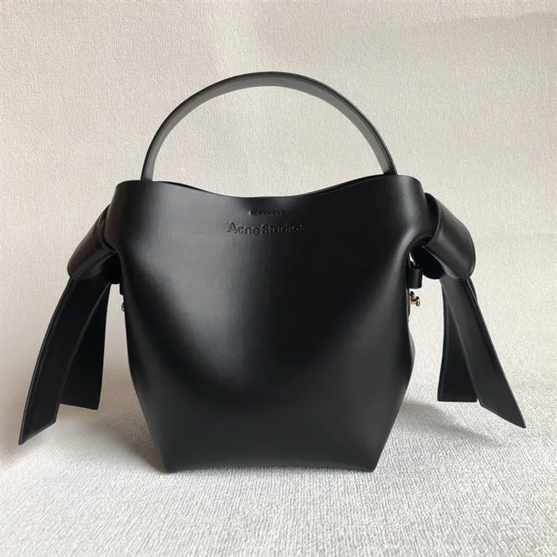 Echini Musubi Mini Cowhide Commuter 다목적 어깨 크로스 바디 핸드백이있는 Bow Knot Bucket Bag