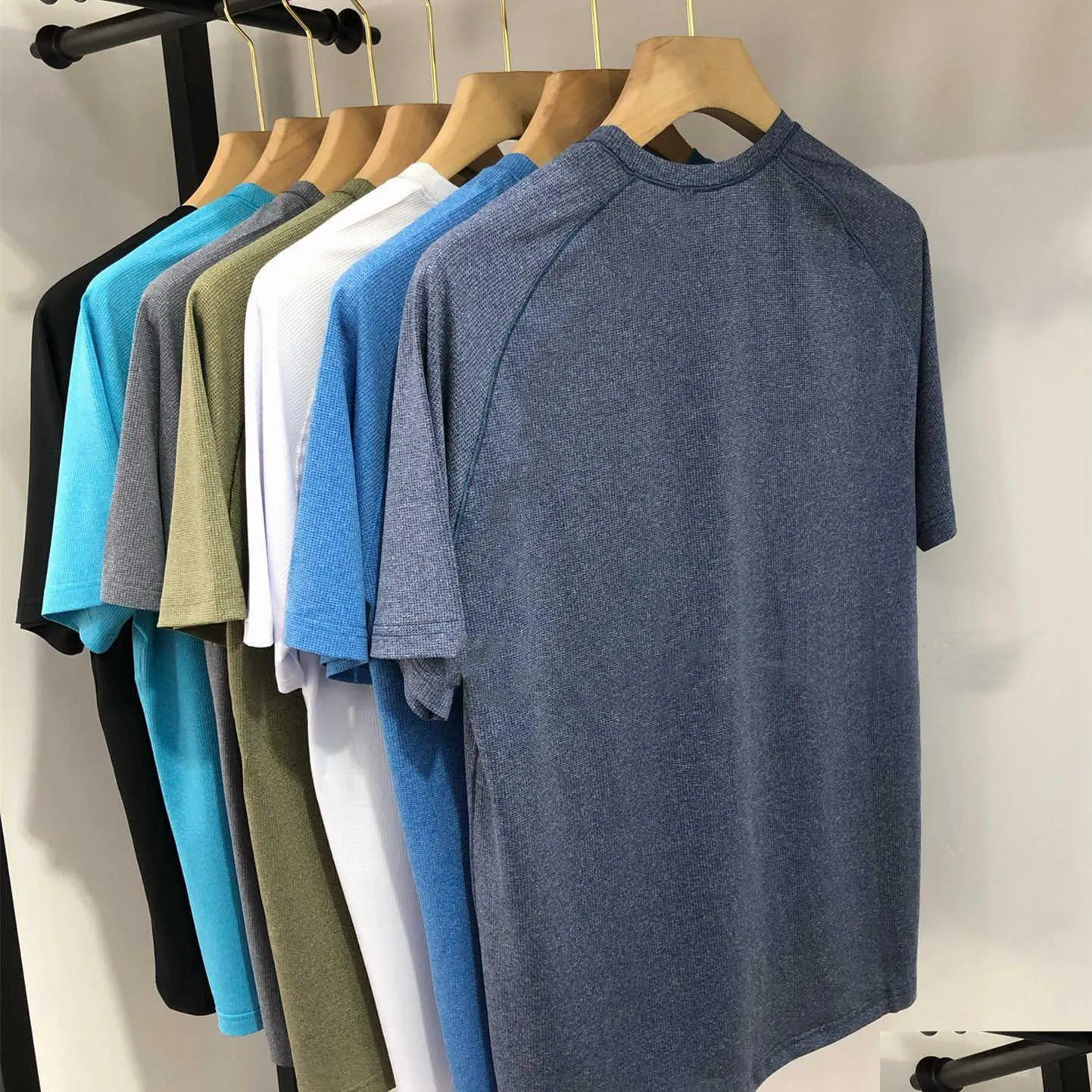 T-shirt Heren Zomer Casual Ademend Ronde Hals Sneldrogend Sport T-shirt Metal Vent Tech Korte Mouwen Drop Delivery Dhpra