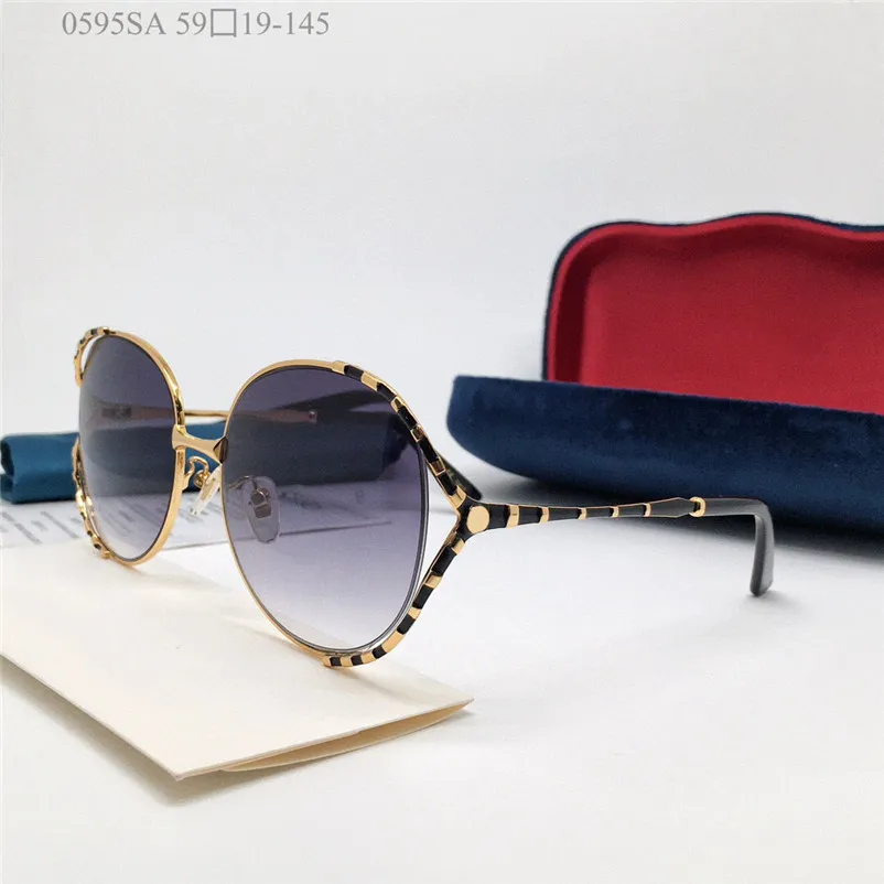 Nya modedesigner kvinnor solglasögon 0595sa stor ram rund ihålig ram enkla populära glasögon toppkvalitet uv400 lins utomhus glasögon