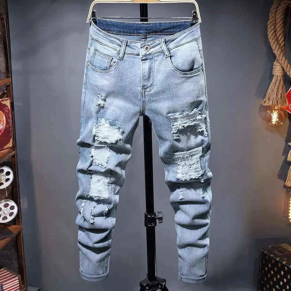 Heren gescheurde herfstontwerper slim fit zwart blauwe denimbroek Mannelijke jeans Distressed vernietigde broek