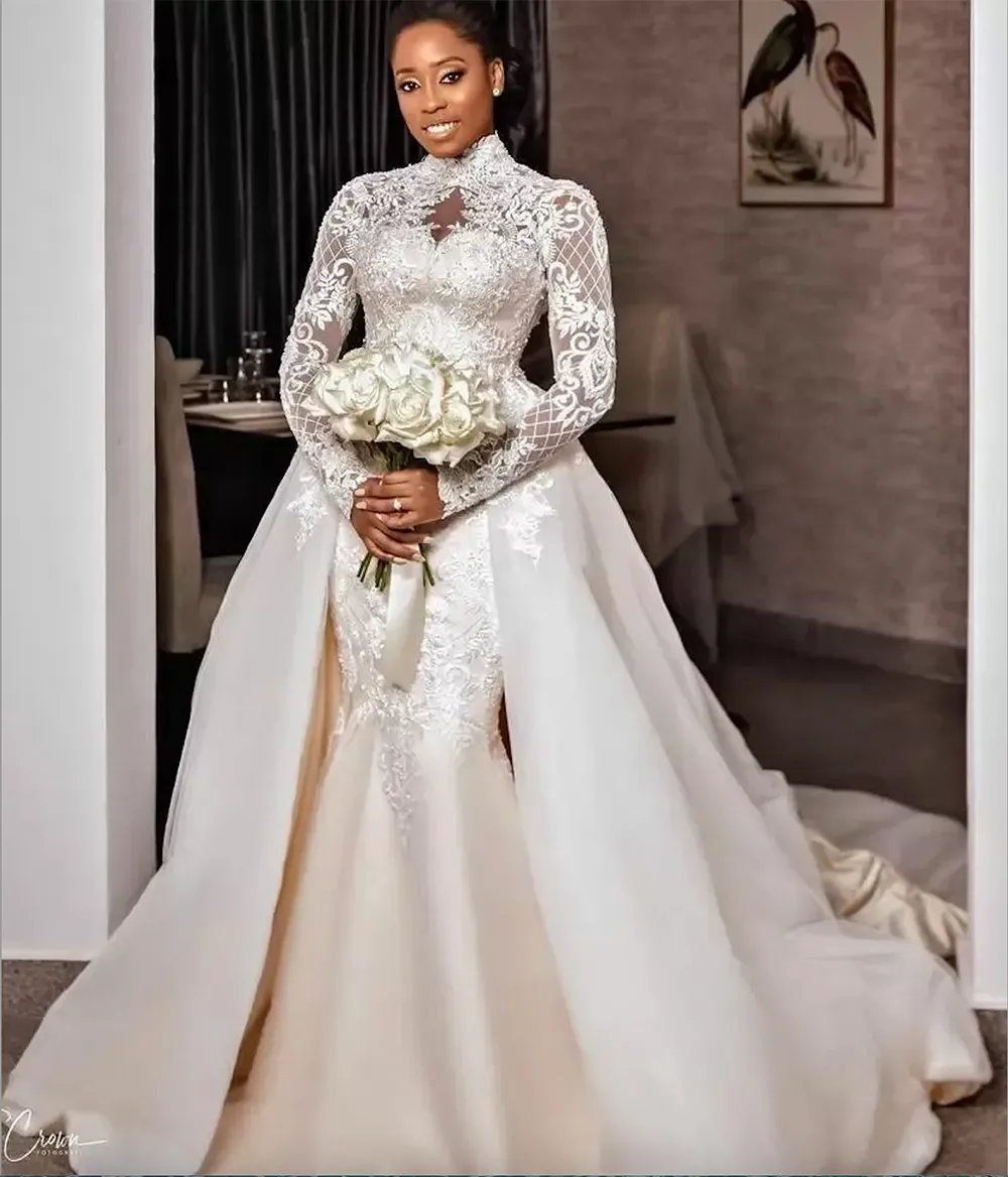 2024 Sexy African Mermaid Wedding Dresses High Neck Illusion Lace Appliques Tulle Long Sleeves Detachable Train Overskirts Muslim Formal Bridal Gowns Plus Size