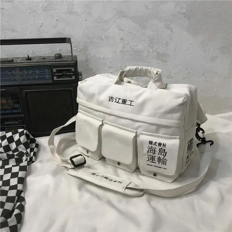 Bortkyror duk bokstäver tryck hip hop japan stil flera fickor axelväskor messenger paket reser avslappnad student män väska handväska