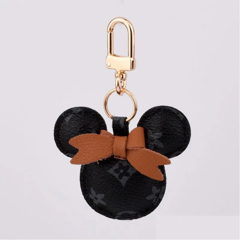 Accessoires de dessin animé Souris Design Voiture Porte-clés Faveur Sac de fleur Pendentif Charme Bijoux Porte-clés pour hommes Cadeau Mode PU Cuir An Dhzcs