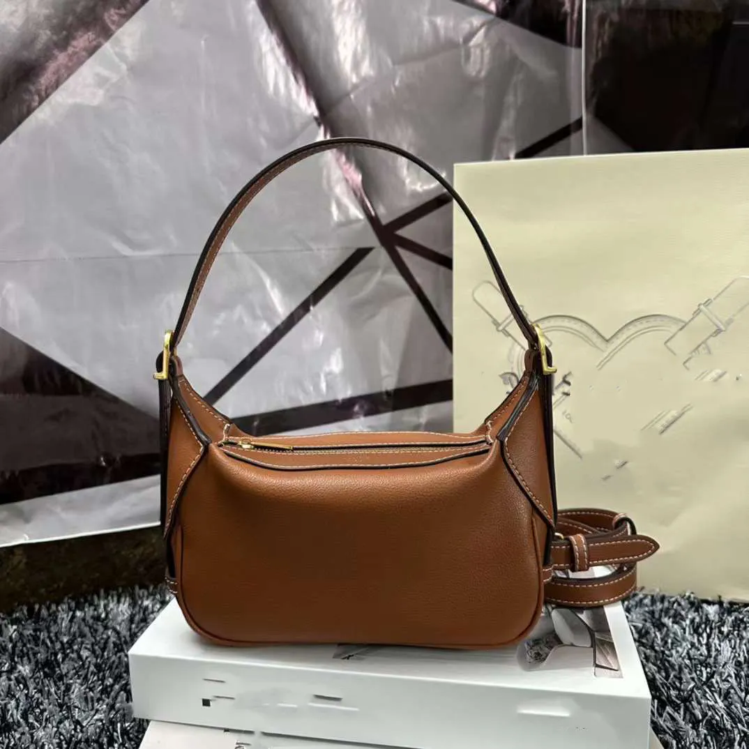 Romy top gold handbags