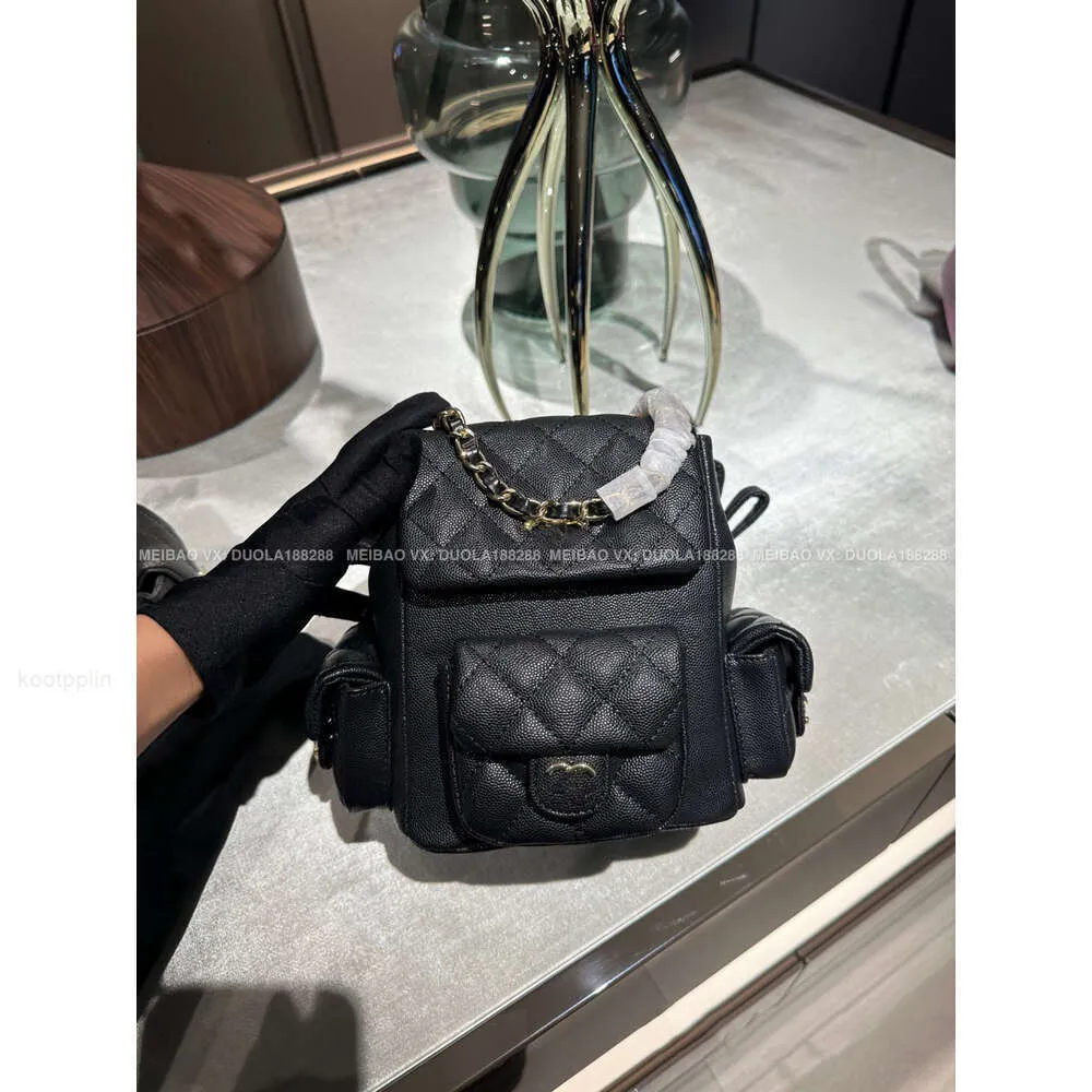 حقائب الظهر للنساء مصمم Chan Girl Girl Womens Luxury Backpack with Spragrance Mini Bags 2023 New Xiaoxiangfeng Frog Duma Small Backback Multi Pocket Caviar C UC20