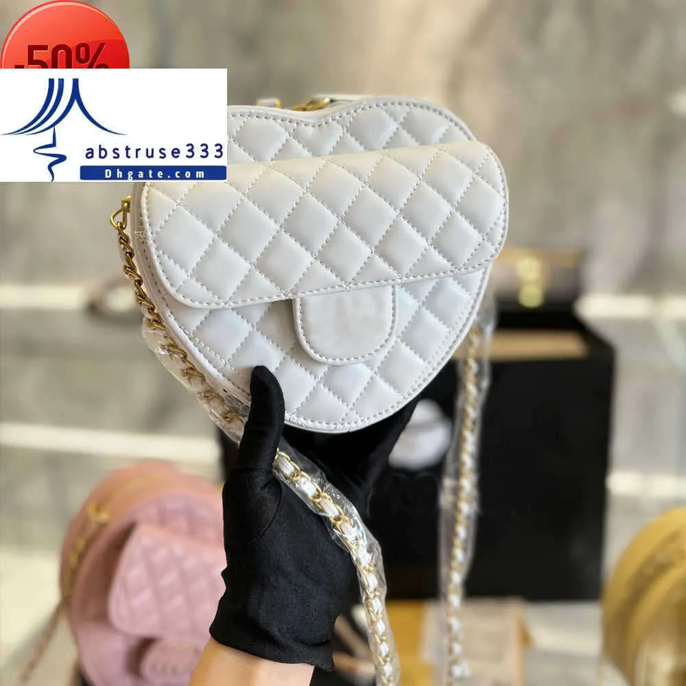 DHgate.com:Limited Edition Heart Channel Purse for Women