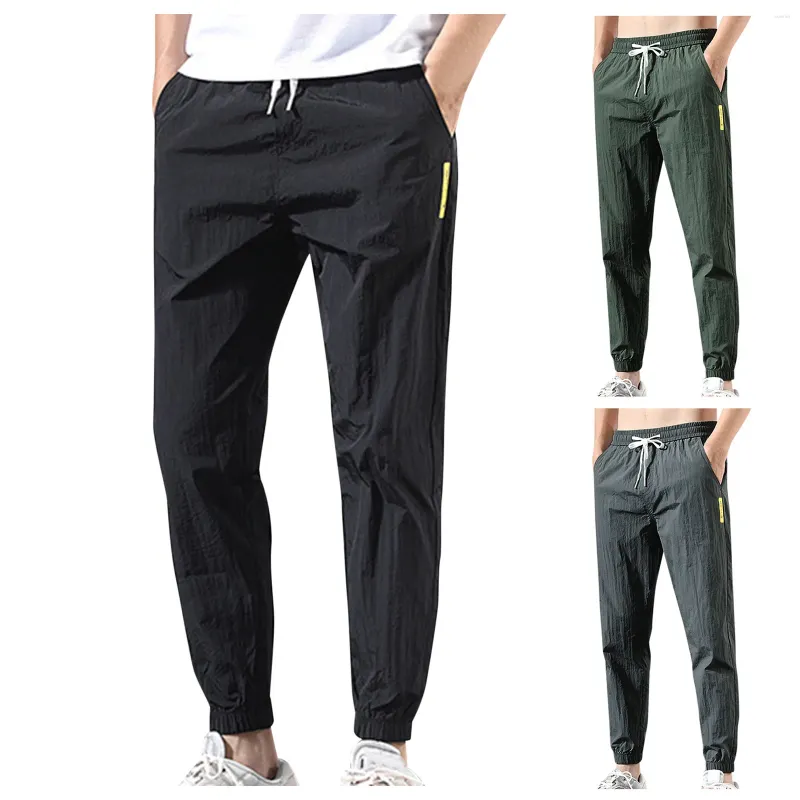 Pantalones para hombres Pantalones casuales de verano para hombre Pies de chándal con tamaño de moda atado más suelto largo al por mayor