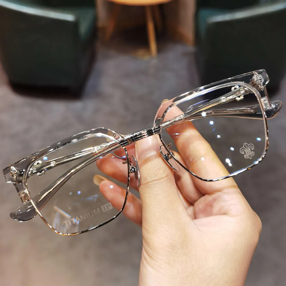 DHgate.com:Trendy Titanium Heart-Shaped Cross Glasses DHgate.com:Trendy Titanium Heart-Shaped Cross Glasses