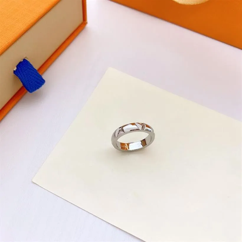Pierścień mody dla mężczyzny kobiety unisex designer pierścionków mężczyzn Kobieta biżuteria 4 kolorów prezenty luksusowe akcesoria278s