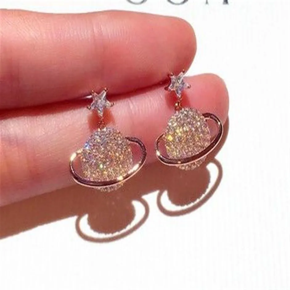 très mignon scintillant nouveau ins designer de luxe diamant strass zircon étoile univers stud dangle lustre boucles d'oreilles de mode pour w173c