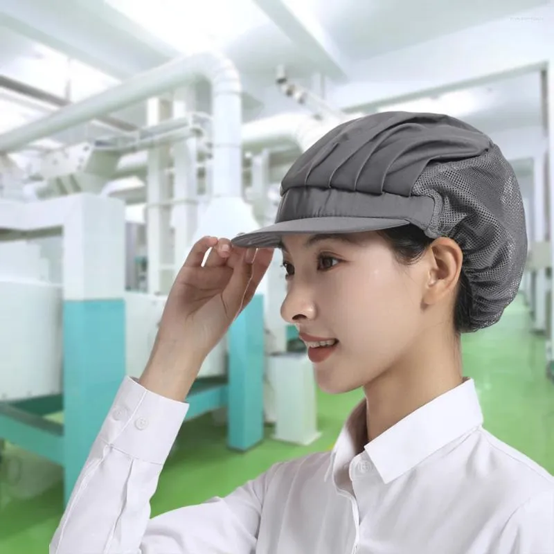バイザー工場で働く帽子の上質な仕上がりワークショップキッチンの着用のため