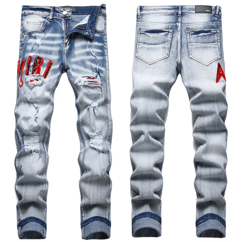 Män jeans brevstjärna am små spot män broderi lapptäcke rippade sexiga romantiska vilda motorcykelbyxor am3613-00 storlek 29-38