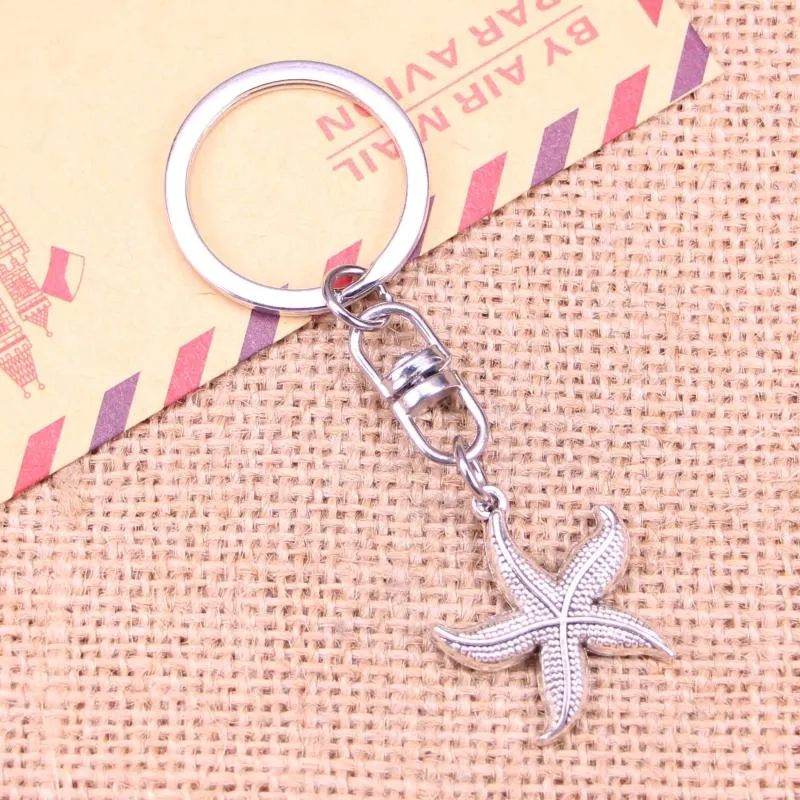 Nyckelringar 20st Fashion Keychain 24mm Starfish Pendants Diy Men smycken bil Key Chain Ring Holder Souvenir för gåva
