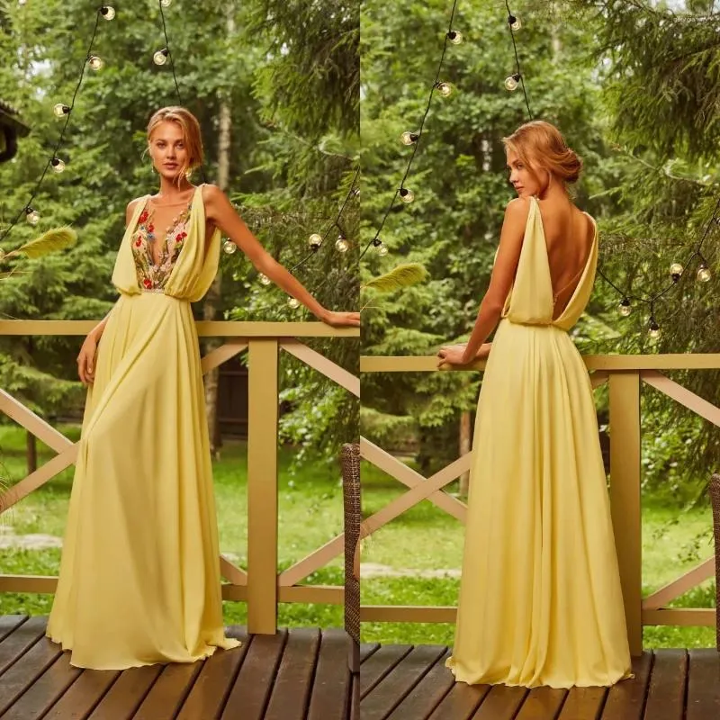 Sukienki imprezowe żółte kwiatowe haftowane balu bez pleców Flowly Maxi suknia bez rękawów