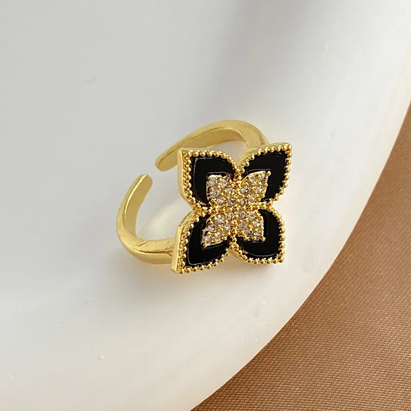 Bague en zircon incrusté de fleurs à quatre feuilles douces pour filles, bague en acier au titane de haute qualité pour femmes, fête de mariage