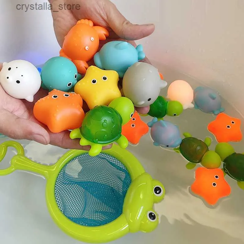 Giocattoli per bambini Giocattoli da bagno per animali per bambini LED Light Up Floating Water Toy Induzione in gomma morbida Giocattoli da doccia luminosi per Boy Girl L230518