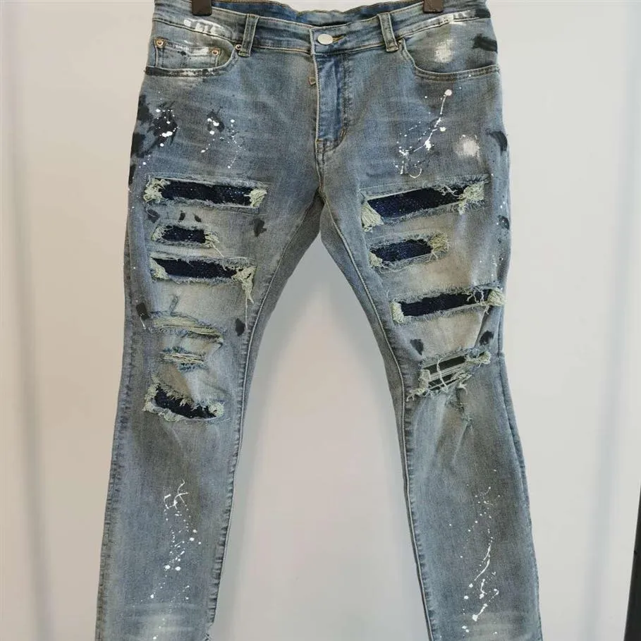 Män jeans lyxiga designbyxor Lång mager blå konstgjord diamant förstör täcken rippad håldesigner Jean Mens Designers Cloth224i