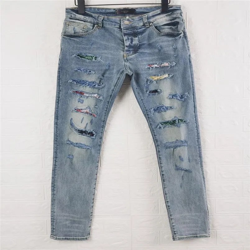 FALECTION UOMO 21SS AMIMIKE JEANS EFFETTO ART WORK PATCH DENIM STRAPPATO jeans252y