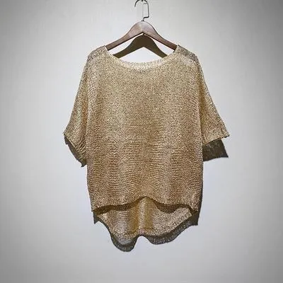 T-shirts Cakucool Women Gold Lurex Knit Pullover Silver Thread Long Batwing hylsa snedstreckhalsskjortor Lös se genom skjorta topp kvinnlig