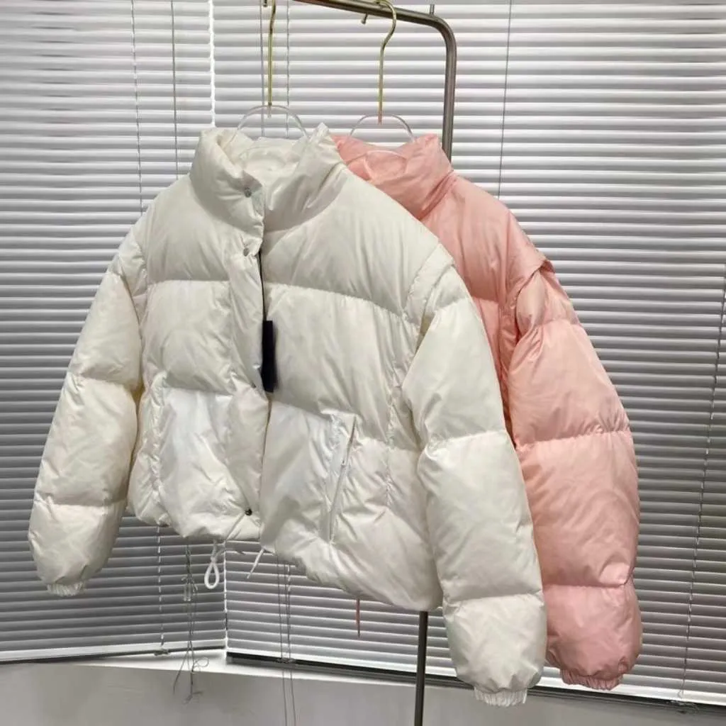 Autumn and winter women plus fluffy stand collar bread down jacket, sleeve down jacket can be removed, coat vest two wear, tender color shows youthful vitality.