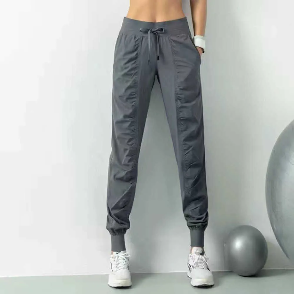 Ll Women Yoga Jogging Pants Loose Sweatpants Women's Fitness Sports Joggers Running Stretch Slimming Feet Sweat Pantsfsil