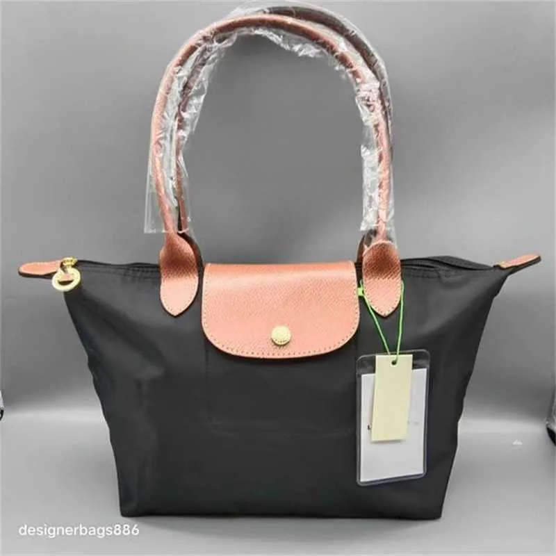 Handtasopruiming Retail Groothandel 95% korting op Fashion Bag Bolsa Brand Handtassen Wallet Luxurys Sac Femme Designer Classic Tote Nieuwe Copput Bags Portemuleert Avond Dames