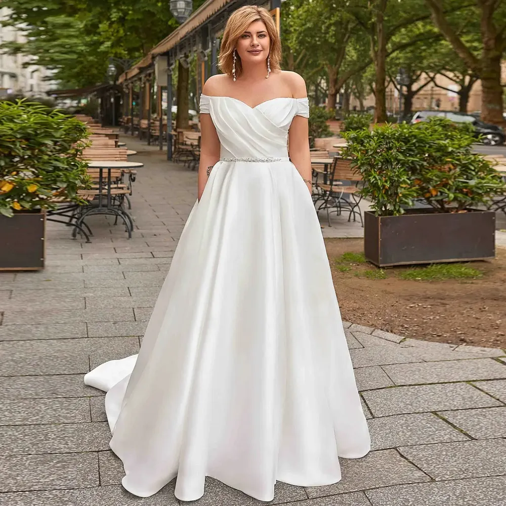 Grande taille une ligne robes de mariée avec poche hors de l'épaule à manches courtes robe de mariée froncé Satin perle ceinture Vestiod do Novia