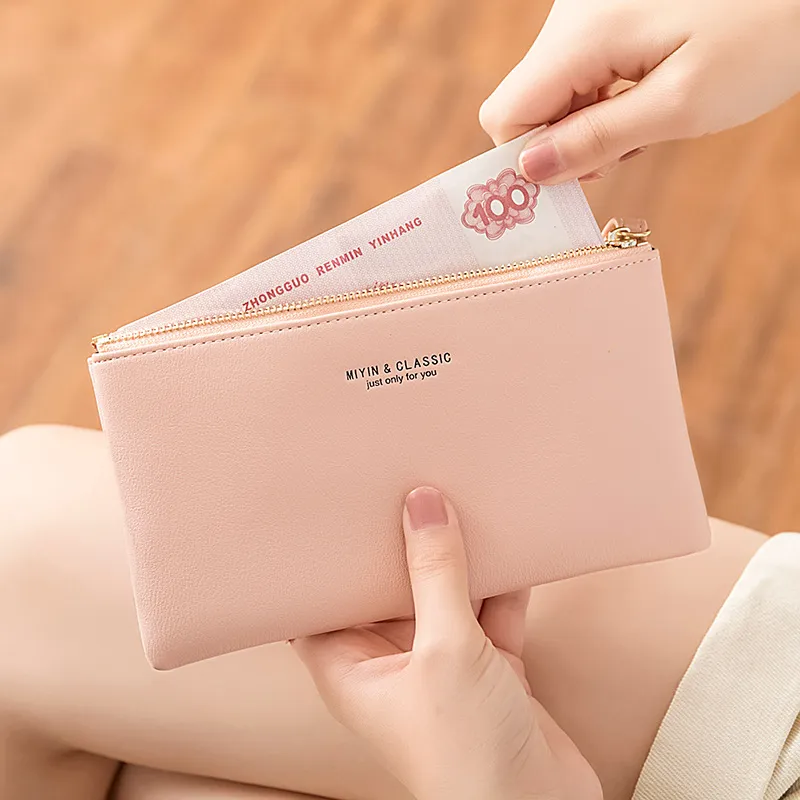 Femmes embrayages pinces à billets Version coréenne portefeuille de couleur Pure nouveau Simple mode porte-monnaie grande capacité en cuir souple téléphone sac