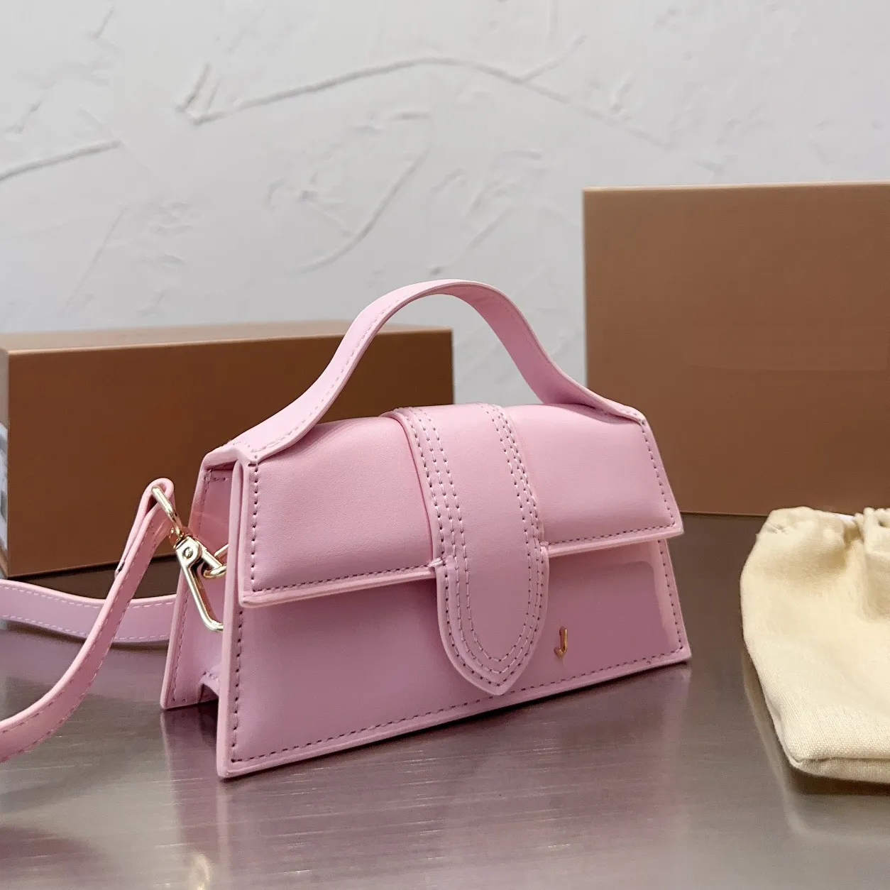Роскошные розовые сумочки мини -мешки с поперечным кузовом дизайнер высококачественная кожаная вечерняя сумка для женщин -дизайнеров.