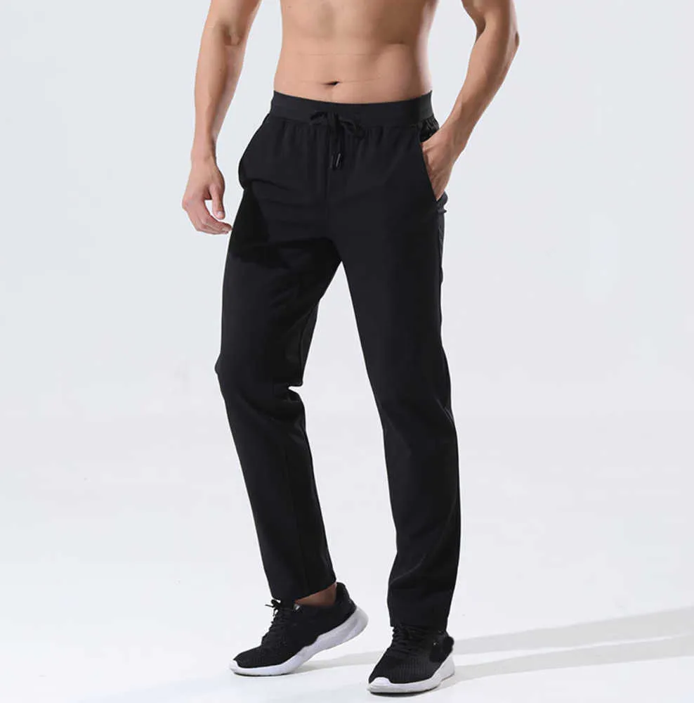 Nuovi pantaloni da yoga sportivi da uomo 2023 Running Jogging Allenamento fitness Pallacanestro Calcio Leggings lunghi Pantaloni elastici ad asciugatura rapida