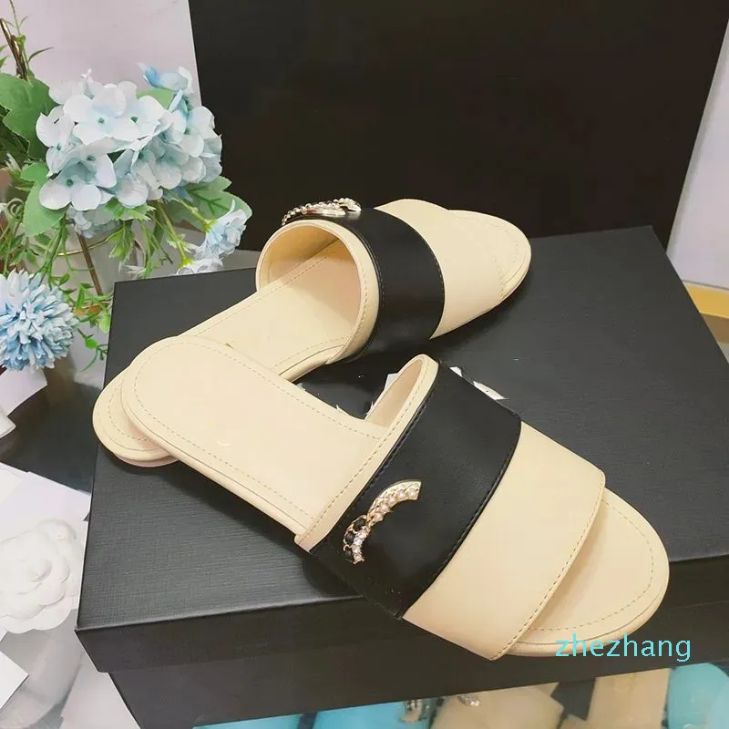 2023-damskie klapki sandały japonki metalowe dekoracje modne buty na plażę antypoślizgowe buty na co dzień Hotel Travel balet jednolity kolor luksusowy projektant